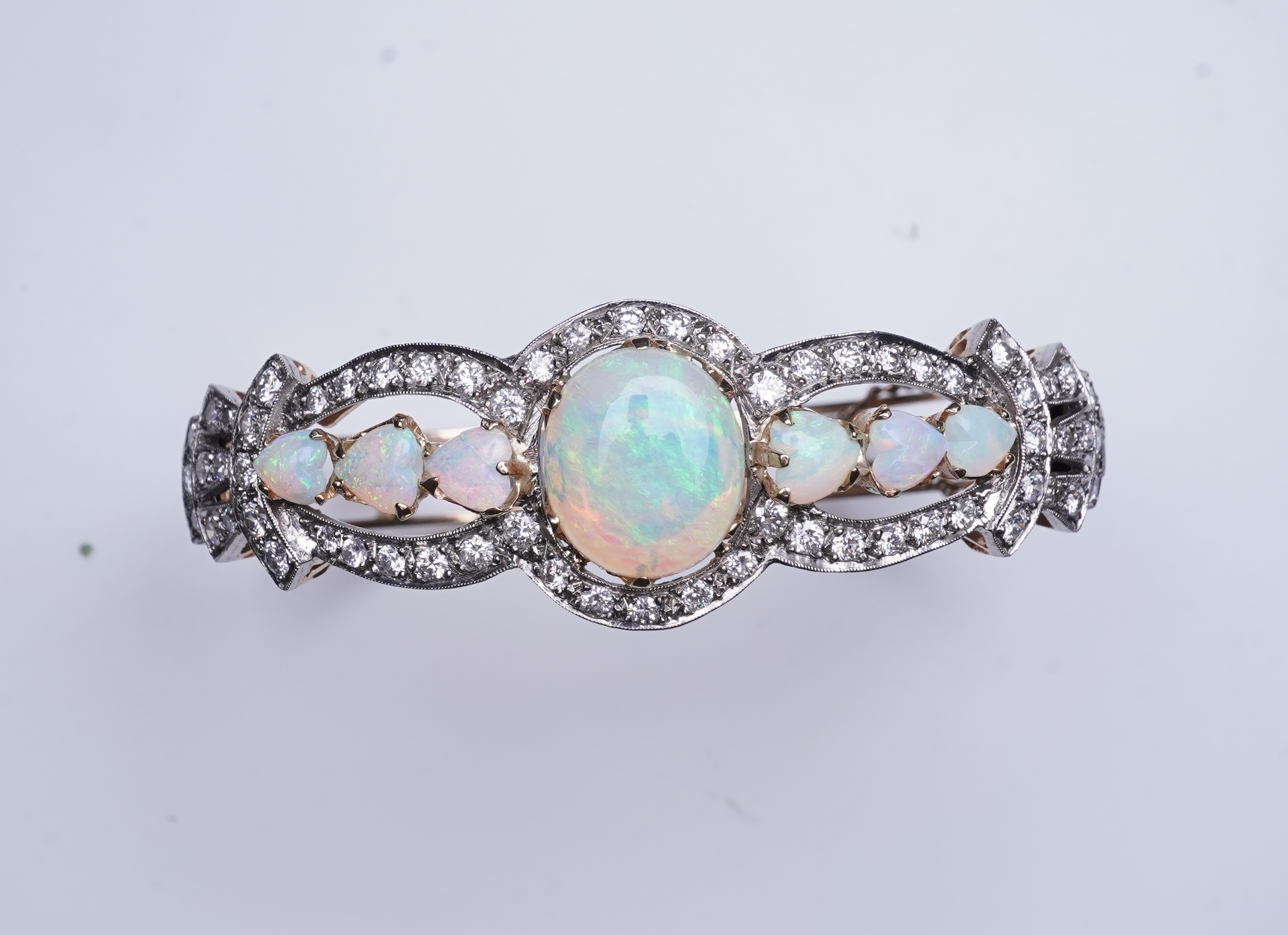 An opal and diamond bangle